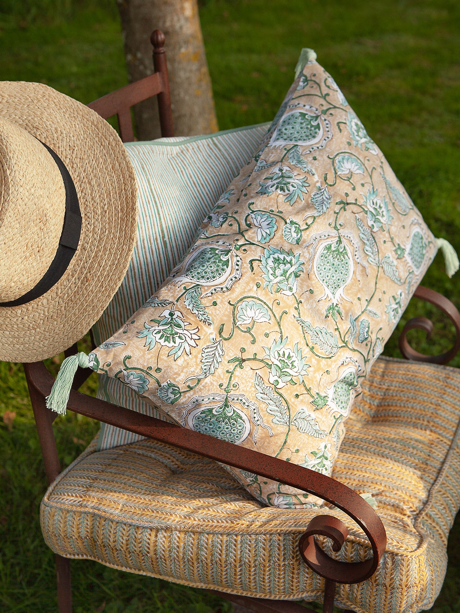 Cushion with beige and green stripes